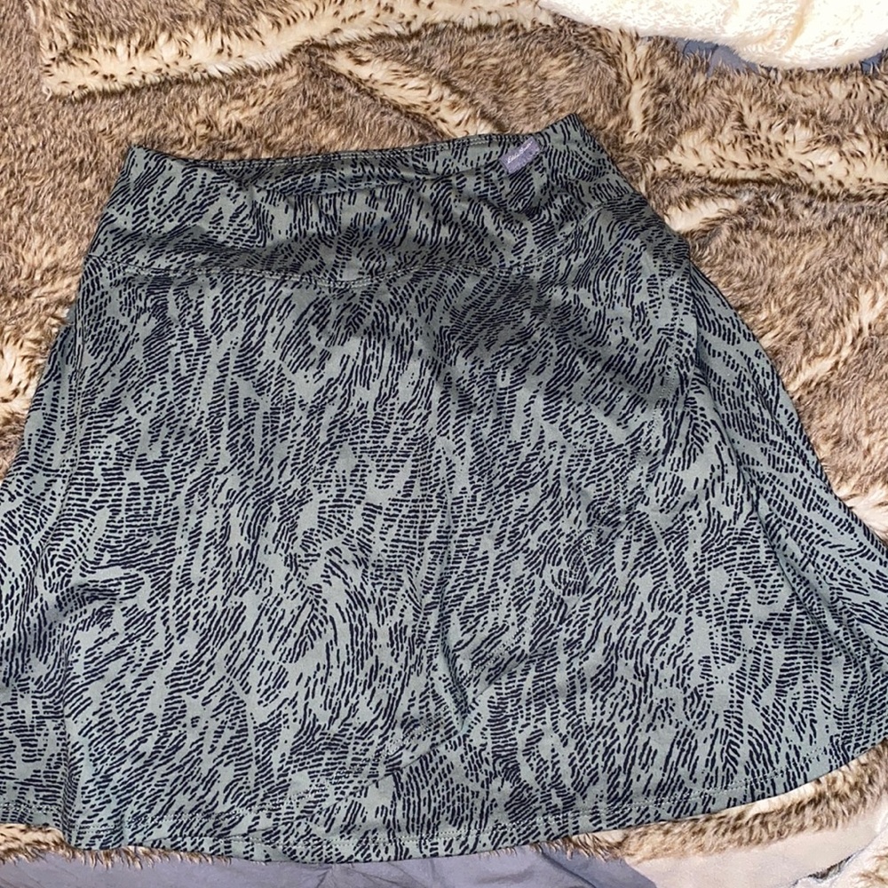 Green and black golf/tennis activewear skirt.